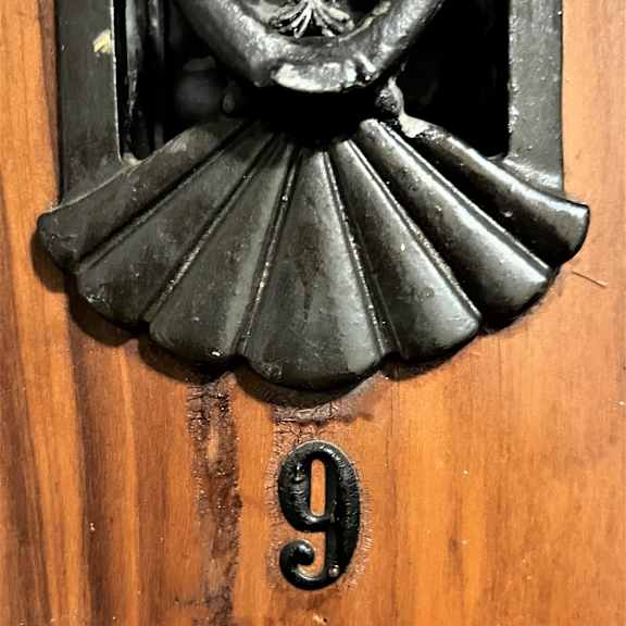 a close up of a door with a number 9 on it