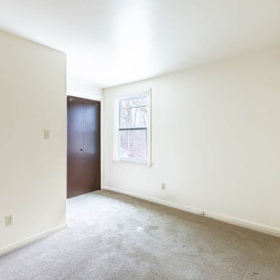 a room with a door and a window.