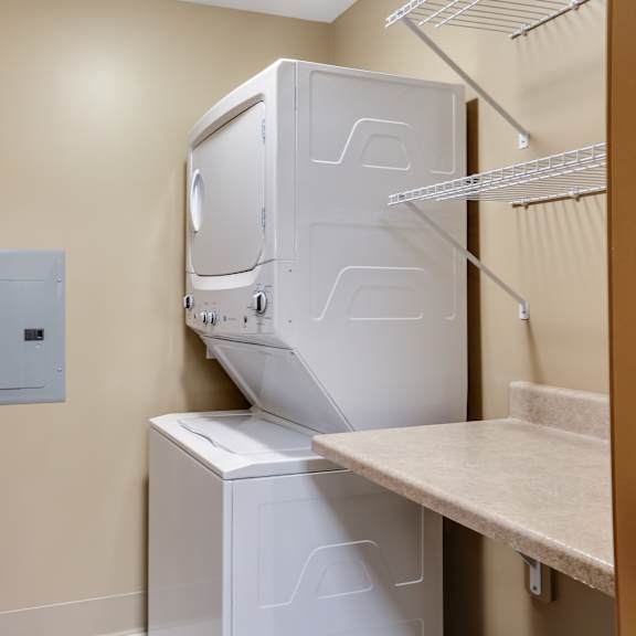 a washer and dryer in the laundry room of a home