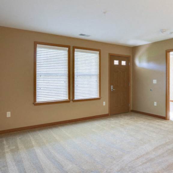 deer lakes apartments – living room – air conditioning - in-unit washer and dryer – patio – ask for a tour - pet friendly