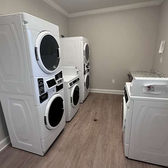 a kitchen with a stove and a oven and a microwave