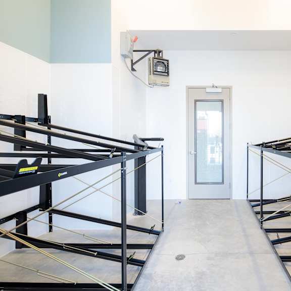 a room with bunk beds and a door.