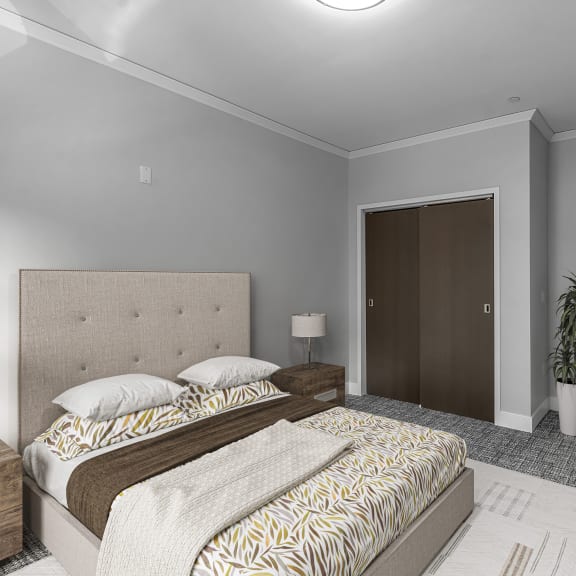 Thumbnail 1 of 14 a bedroom with a bed and a door to a bathroom at Nineteen North Apartments , Buffalo, 14202