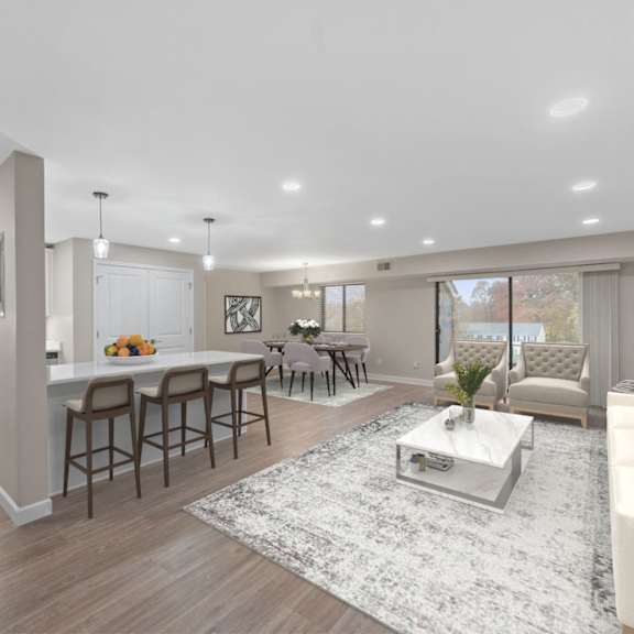 Thumbnail 5 of 14 a living room with a kitchen and a dining room at Indian Creek Apartments*, Cincinnati, OH