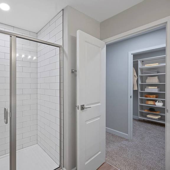 Thumbnail 13 of 14 a white bathroom with a shower and a closet at Indian Creek Apartments*, Cincinnati