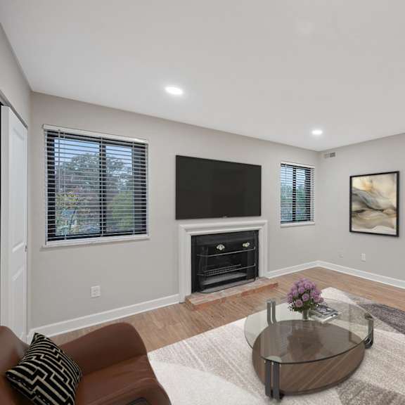 Thumbnail 7 of 14 a living room with a couch and a coffee table at Indian Creek Apartments*, Ohio, 45236