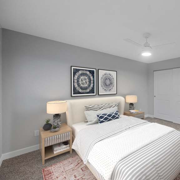 Thumbnail 11 of 14 a bedroom with a large bed and a ceiling fan at Indian Creek Apartments*, Cincinnati, Ohio