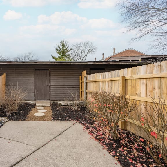 Thumbnail 20 of 21 a house with a wooden fence and a sidewalk in front of it at Indian Creek Apartments*, Ohio, 45236