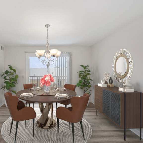 Thumbnail 5 of 10 A dining room with a round table and chairs. at Indian Creek Apartments*, Cincinnati, OH