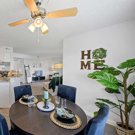 living room with a dining table and a kitchen at wrights point, 41011