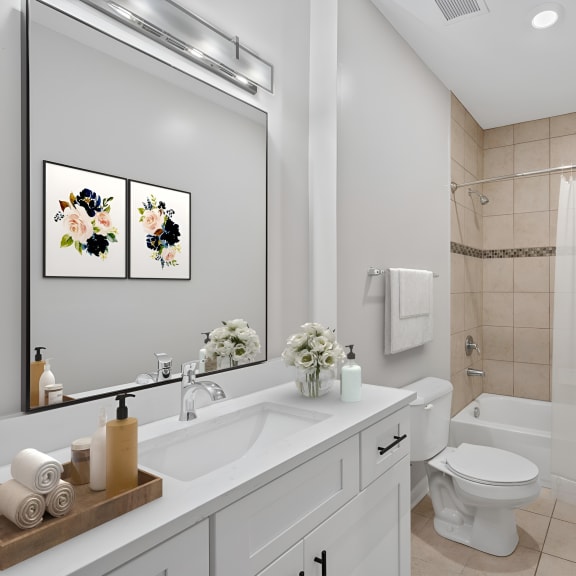 Thumbnail 8 of 8 a bathroom with a sink toilet and a shower at Monmouth Row Apartments, Newport, KY
