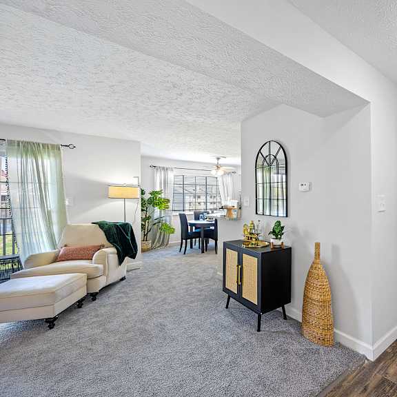open living room and dining room with a white door at wrights point, ft wright, ky