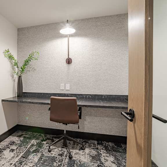 contemporary home office with builtin desk at the yancey apartments, charlotte