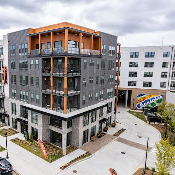 modern apartment building exterior with street view at the yancey apartments, charlotte, 28217