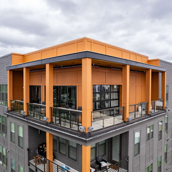 rooftop amenity deck with covered pavilion and skyline views at the yancey apartments, charlotte, nc