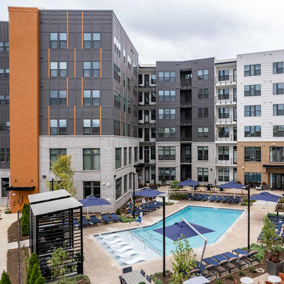 courtyard pool area surrounded by modern apartment buildings at the yancey apartments, charlotte, north carolina