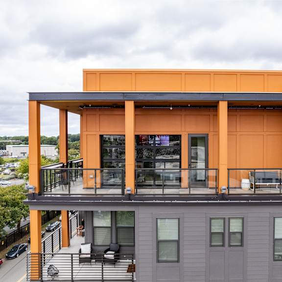 rooftop terrace with covered pavilion and outdoor seating at the yancey apartments, charlotte