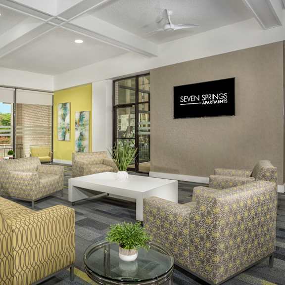 a waiting area with a sign that says "seven springs apartments".