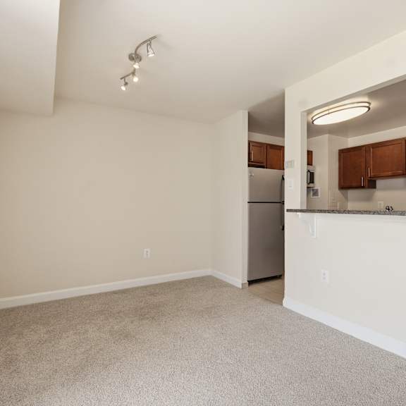 a kitchen area with a countertop and cabinets.
