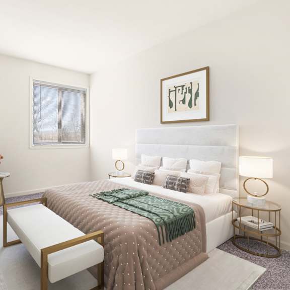 a bedroom with a large bed, a chair, and a tv at seven springs apartments, college park