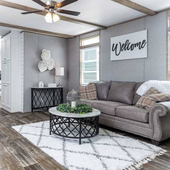 a living room with two couches and a coffee table