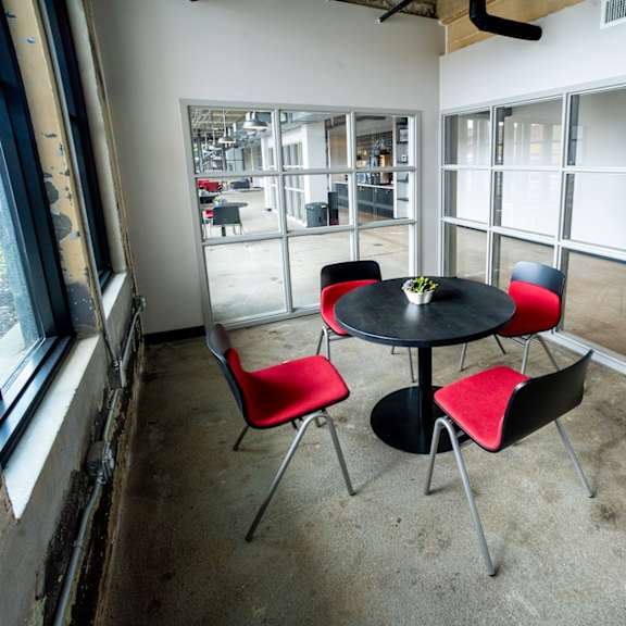 a room with a table and chairs in it at conwood flats, tennessee, 38107