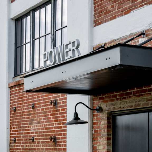 awning of a building with the word power on it at conwood flats, memphis