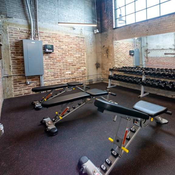 a view of the weights area in the gym at conwood flats, memphis, tennessee