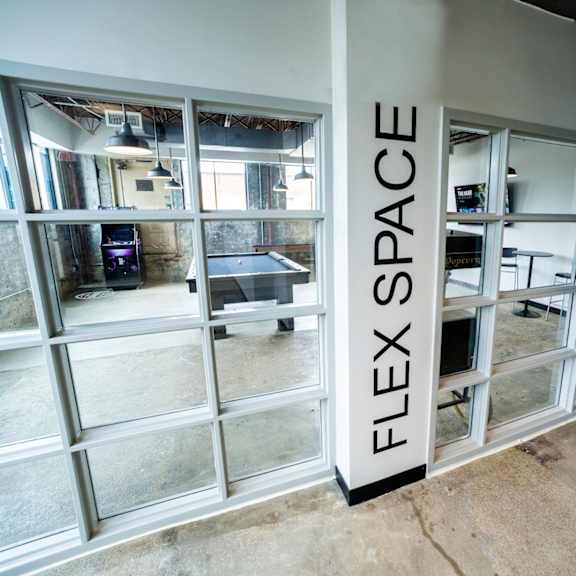 a large white door with large black letters on it at conwood flats, tennessee, 38107