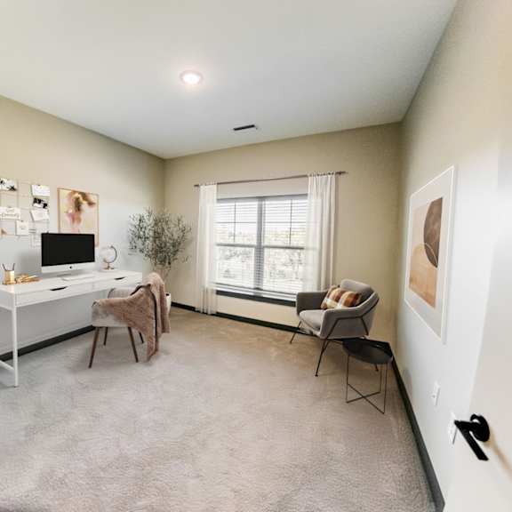 a room with a desk, chair, and a window at harbor side at conwood flats apartments, memphis, tennessee