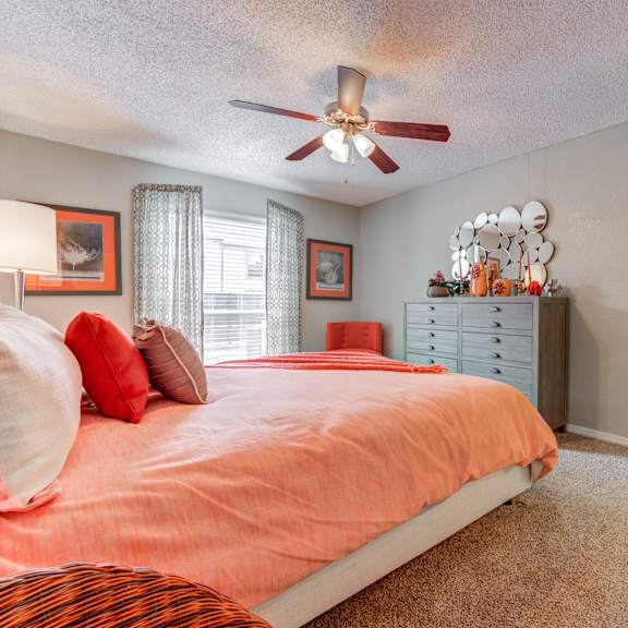 bedroom with a bed and a ceiling fan at sausalito apartments, texas, 77840
