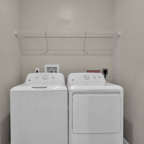a washer and dryer in a laundry room