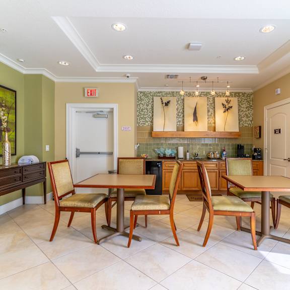 a clubhouse with tables and chairs