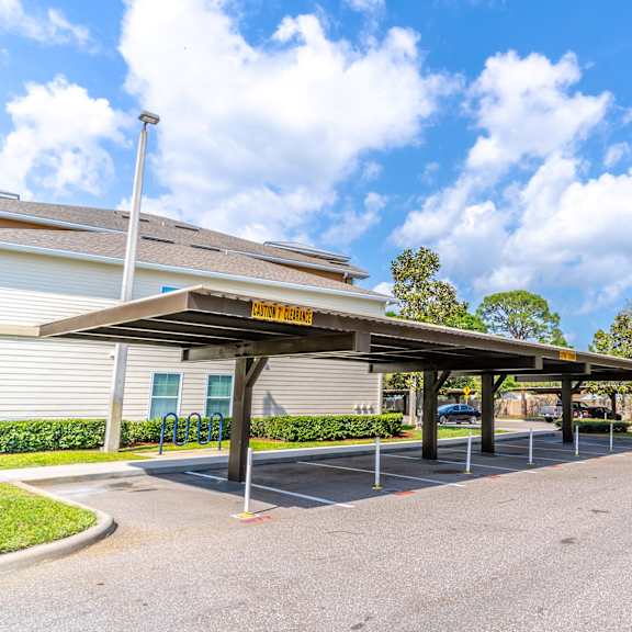 covered parking in front of a building