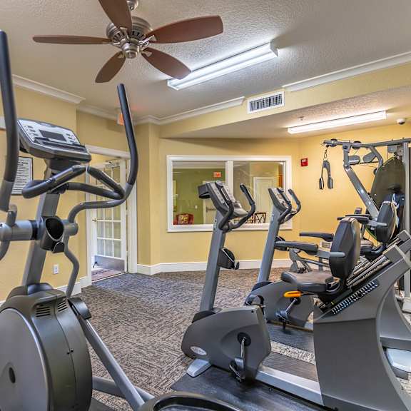 a fitness center with tv