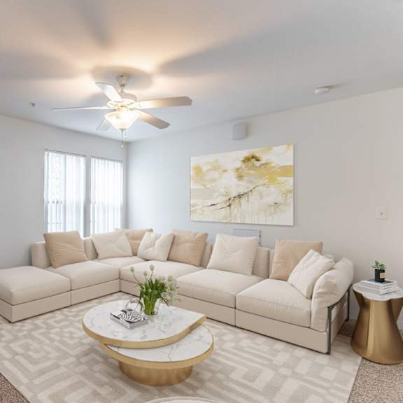 a living room with a large couch and a coffee table