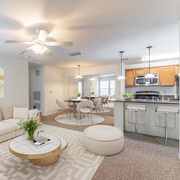 a living room with couches and a coffee table