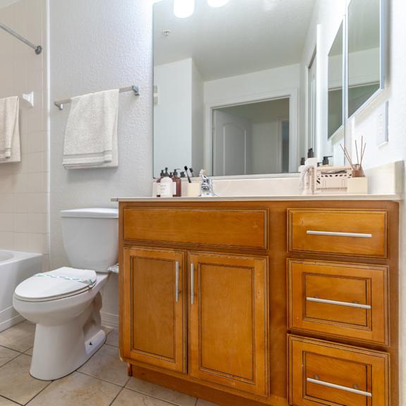 a bathroom with a toilet sink and bathtub