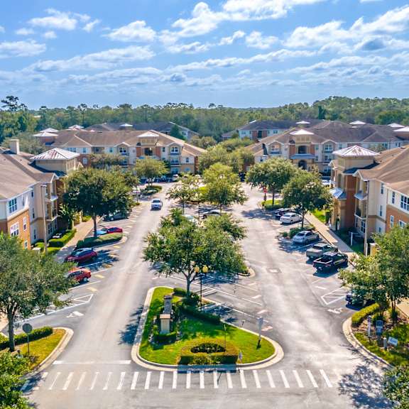 an aerial view of a neighborhood with houses and trees