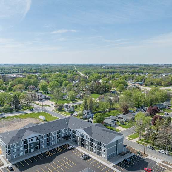 an aerial view of a large building in a city