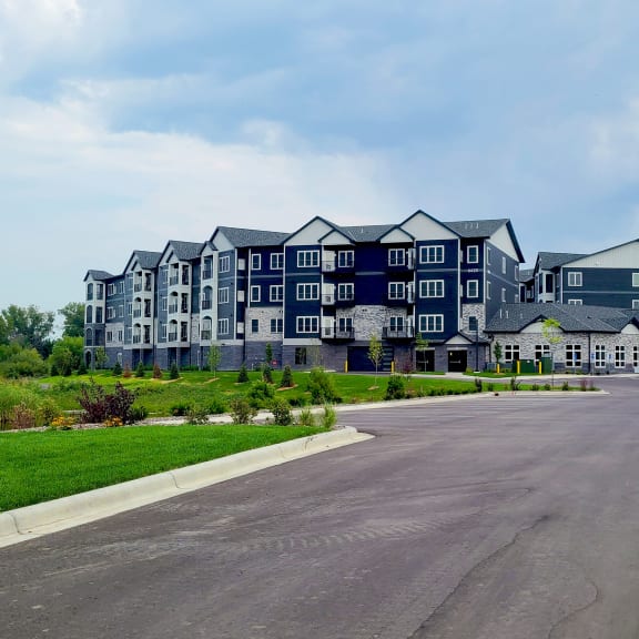 a large building with a road in front of it