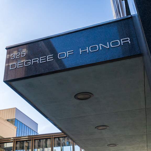 a building with a sign that says degree of honor.