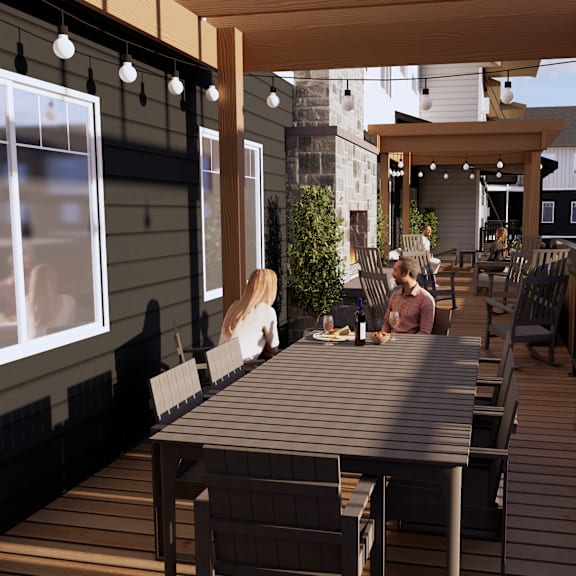a patio with a table and chairs is shown with a blurred background.