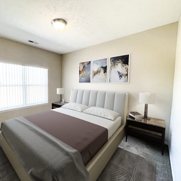 a bedroom with a bed and a plant