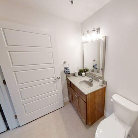 a bathroom with a toilet and a sink