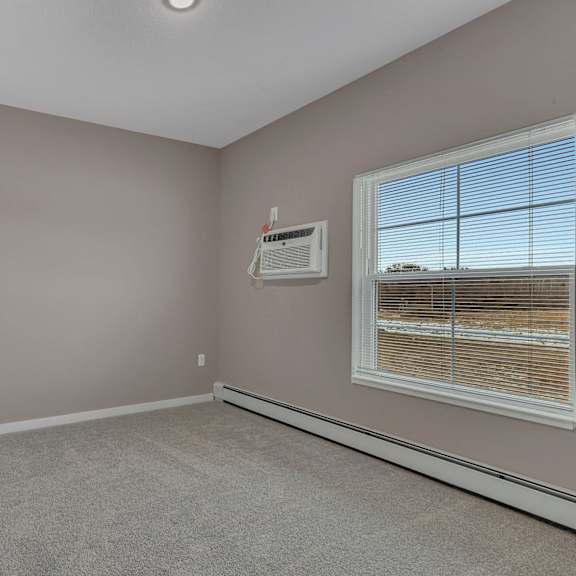 a room with a window and a door.