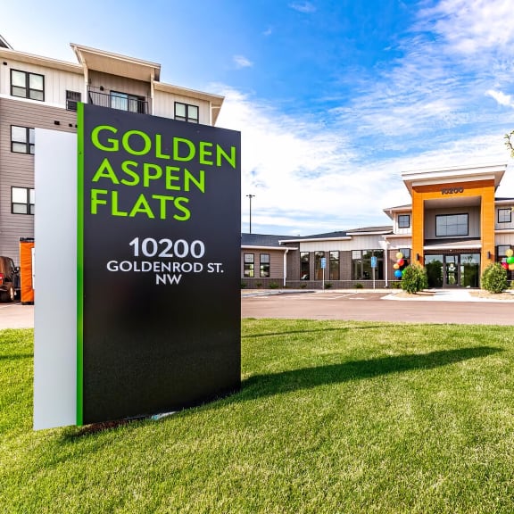 property monument sign in the grass in front of the leasing building