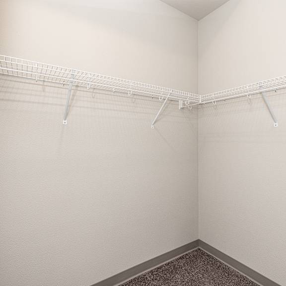 a room with a white wall and a white door.