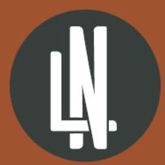 a white ln logo on an orange background