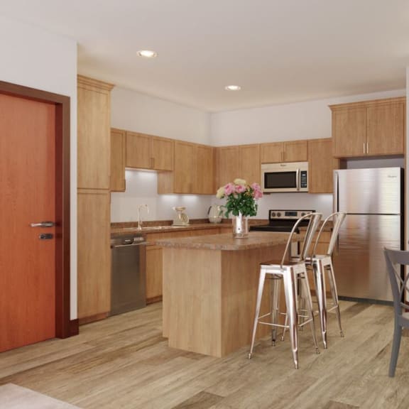 a kitchen and dining room with a table and chairs